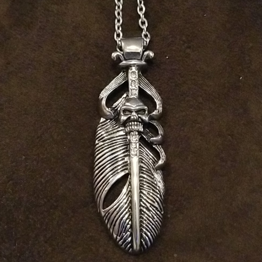 Stainless steel necklace and charm